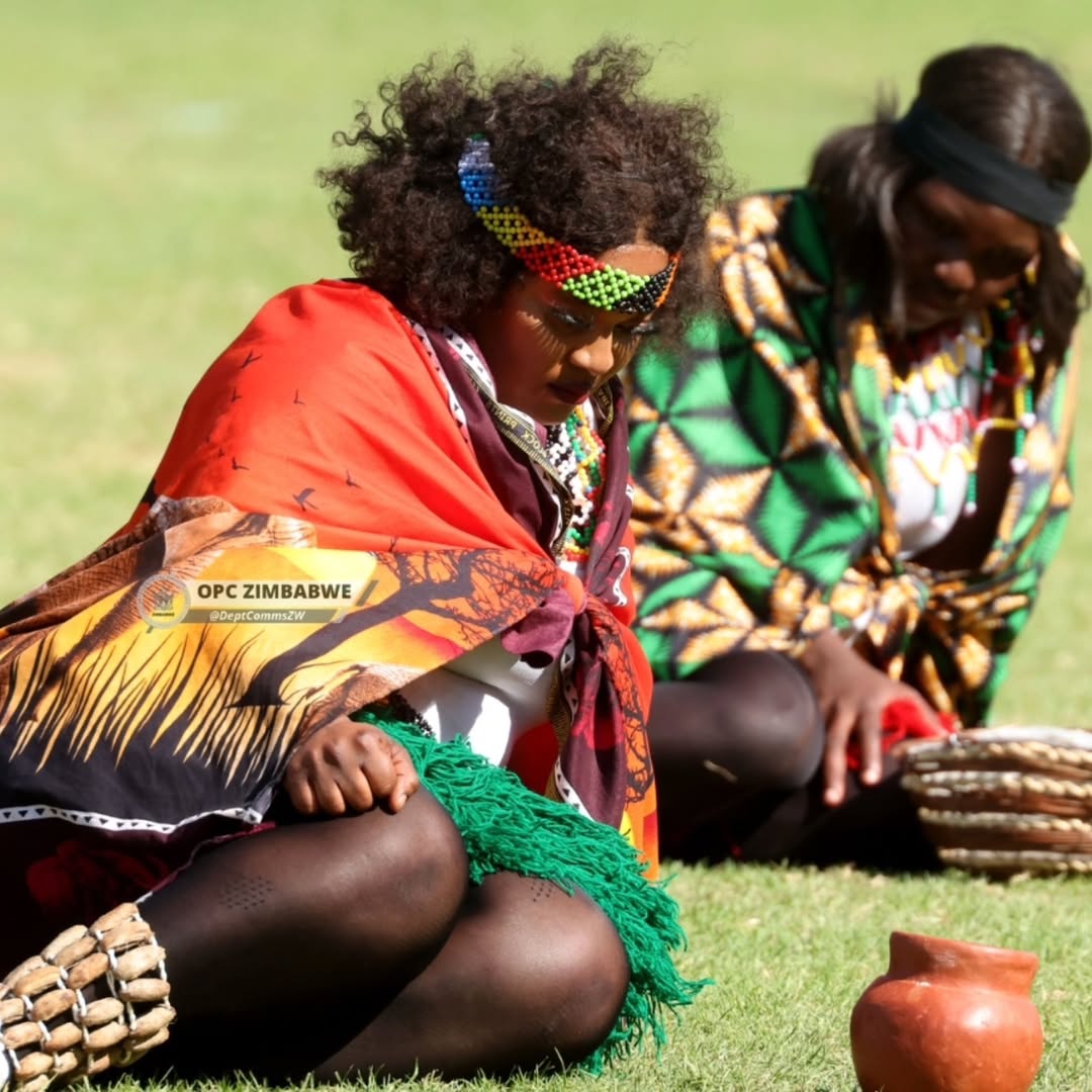 Traditional performers in cultural regalia
